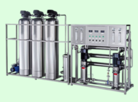 Commercial water filtration system with three large tanks and a control panel on a light green background.
