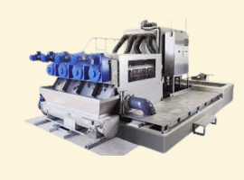 Industrial machine with blue components mounted on a large metal base, designed for heavy-duty processing tasks.